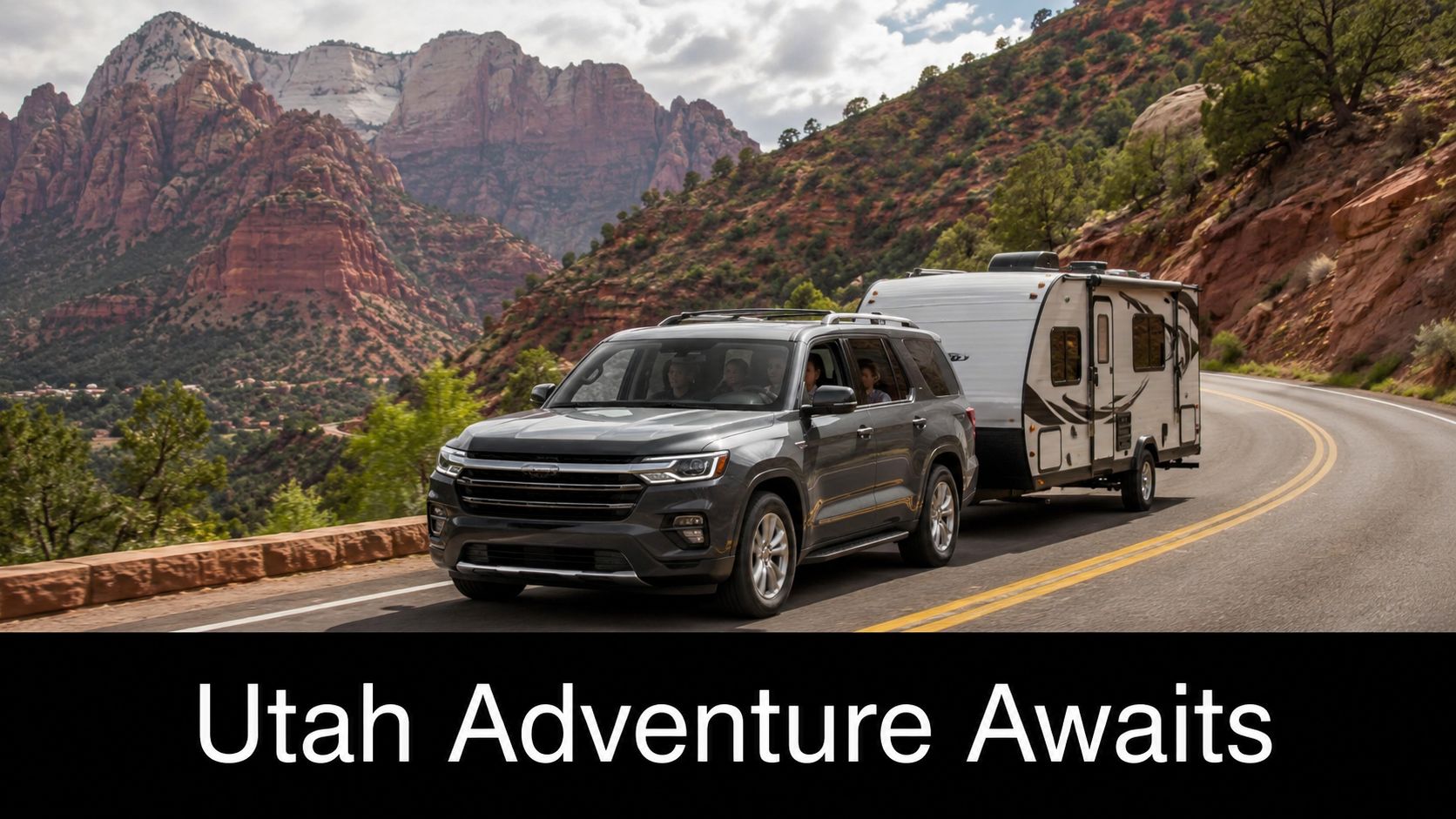 A gray Chevrolet SUV towing a white travel trailer along a scenic road through Zion National Park.